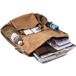 Brown backpack with various items including a laptop, phone, and bottles.