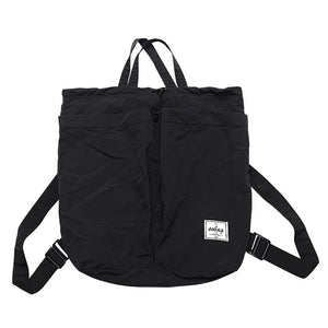 Black backpack with a visible brand label on a white background