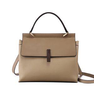 genuine leather shoulder tote bag with a strap on a white background