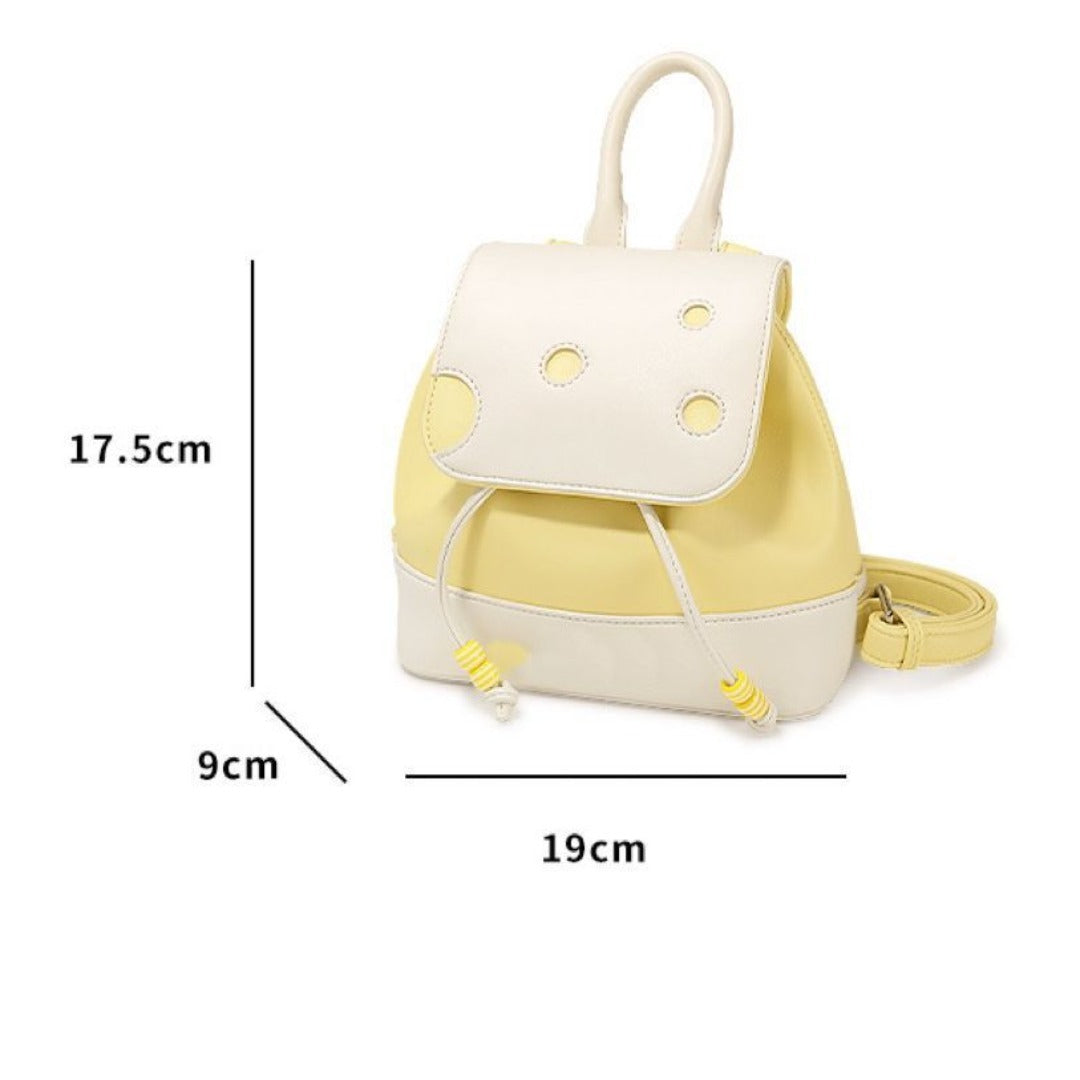 Yellow and white backpack with measurements on a white background