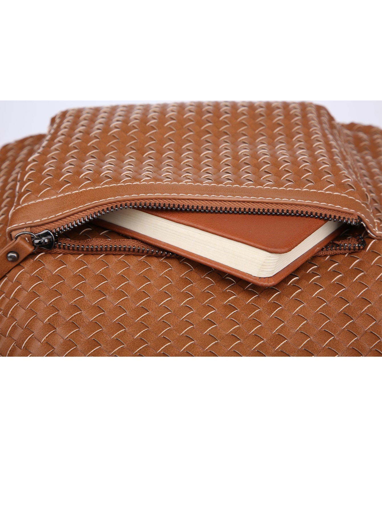 Brown woven leather bag with a zipper on a white background