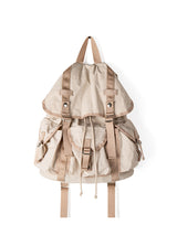 Beige backpack with brown straps on a white background
