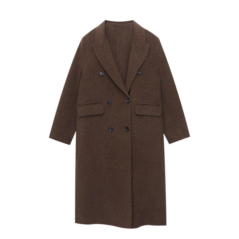 old money style wool coat with black buttons on a white background