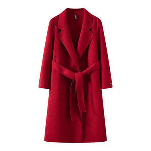 Red women's loose fit mid-length coat with a belt on a white background