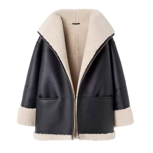 Black shearling collar biker jacket with beige shearling lining on a white background