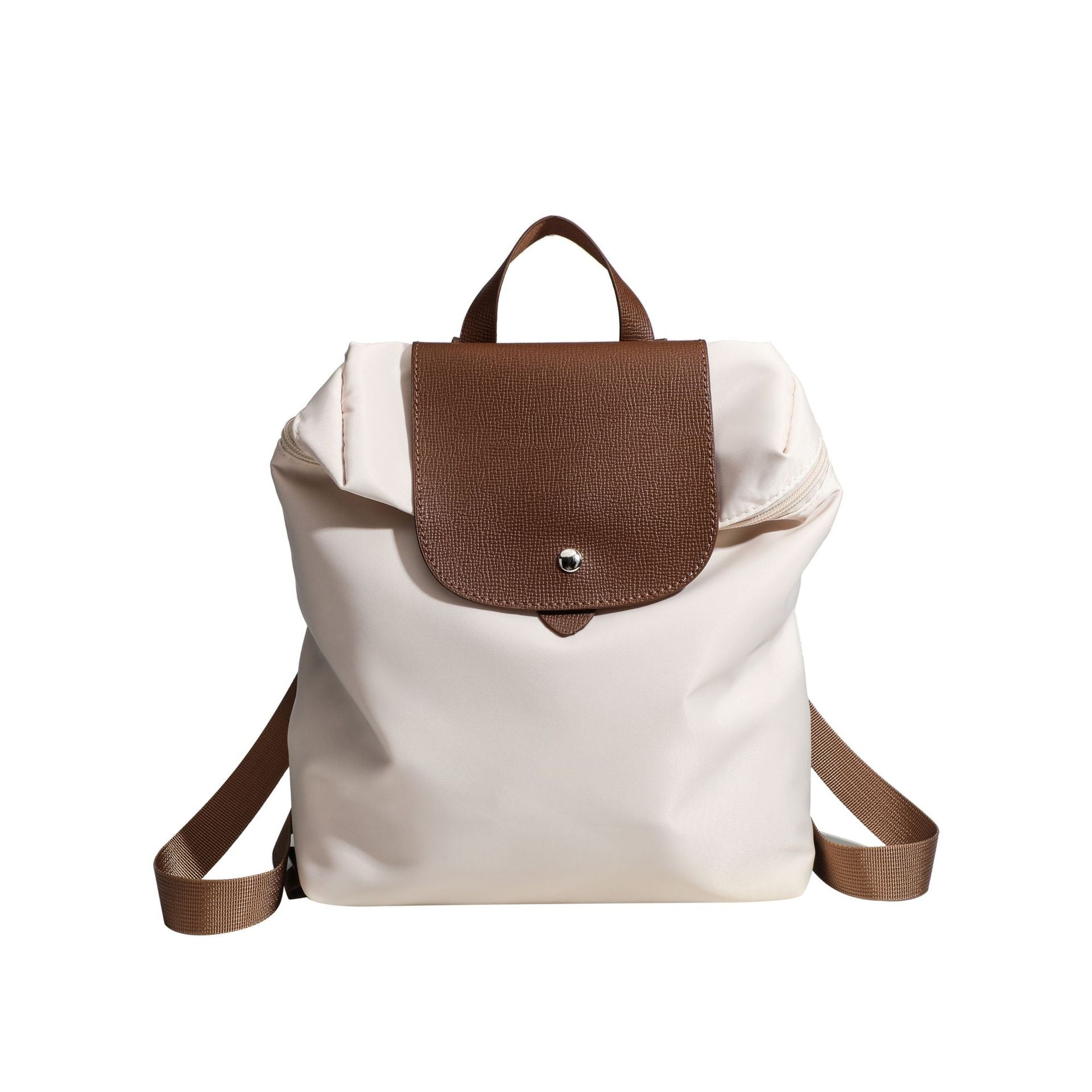 nylon commuter backpack with brown leather flap and straps on a white background