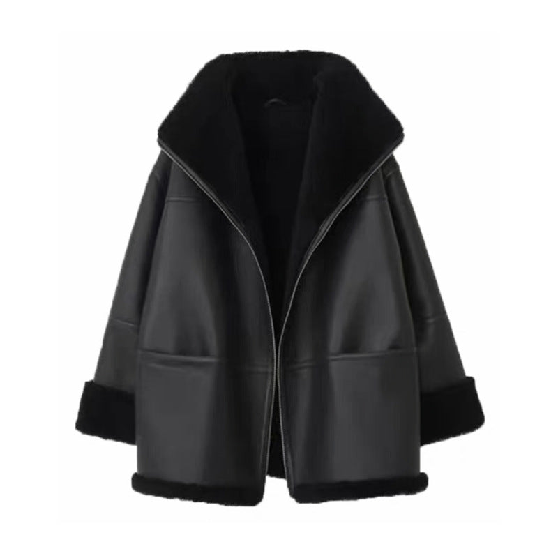 Black leather jacket with fur trim on a white background