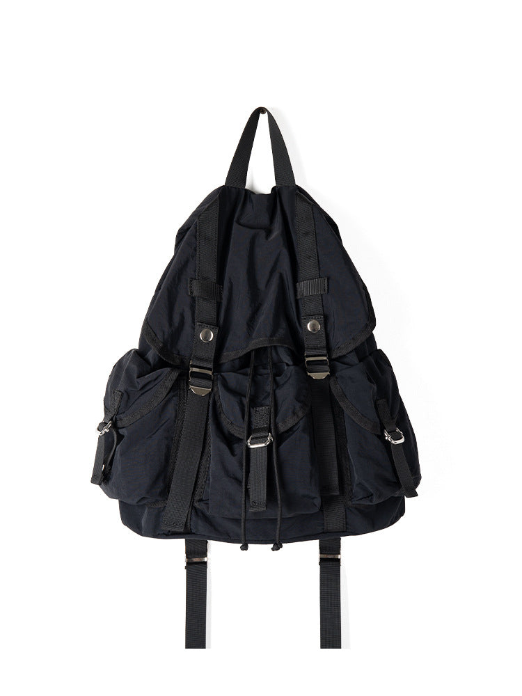 Black backpack on a white background