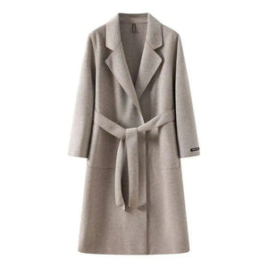 women's loose fit mid-length coat on a white background