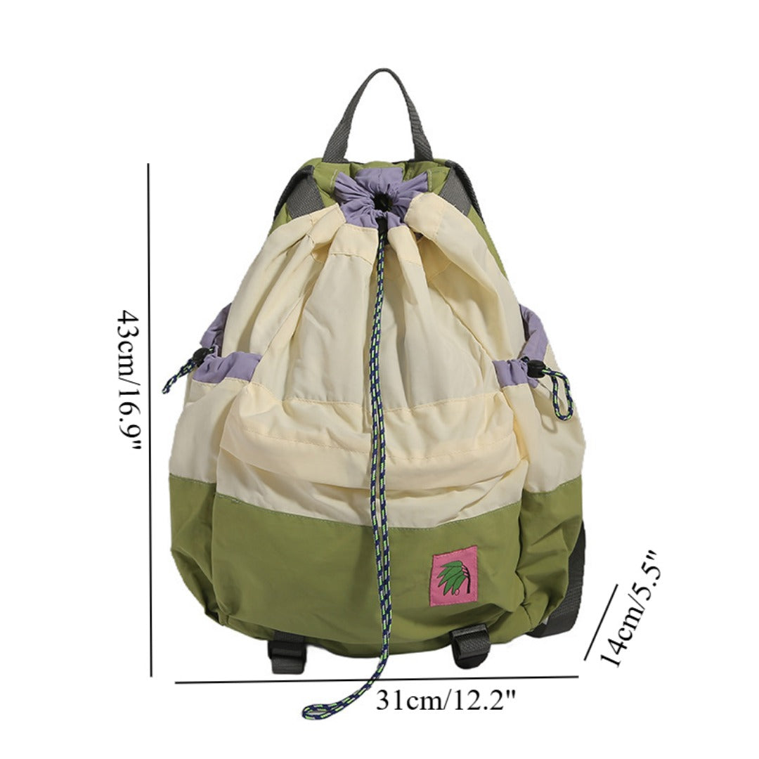 Green and beige drawstring bag with measurements on a white background